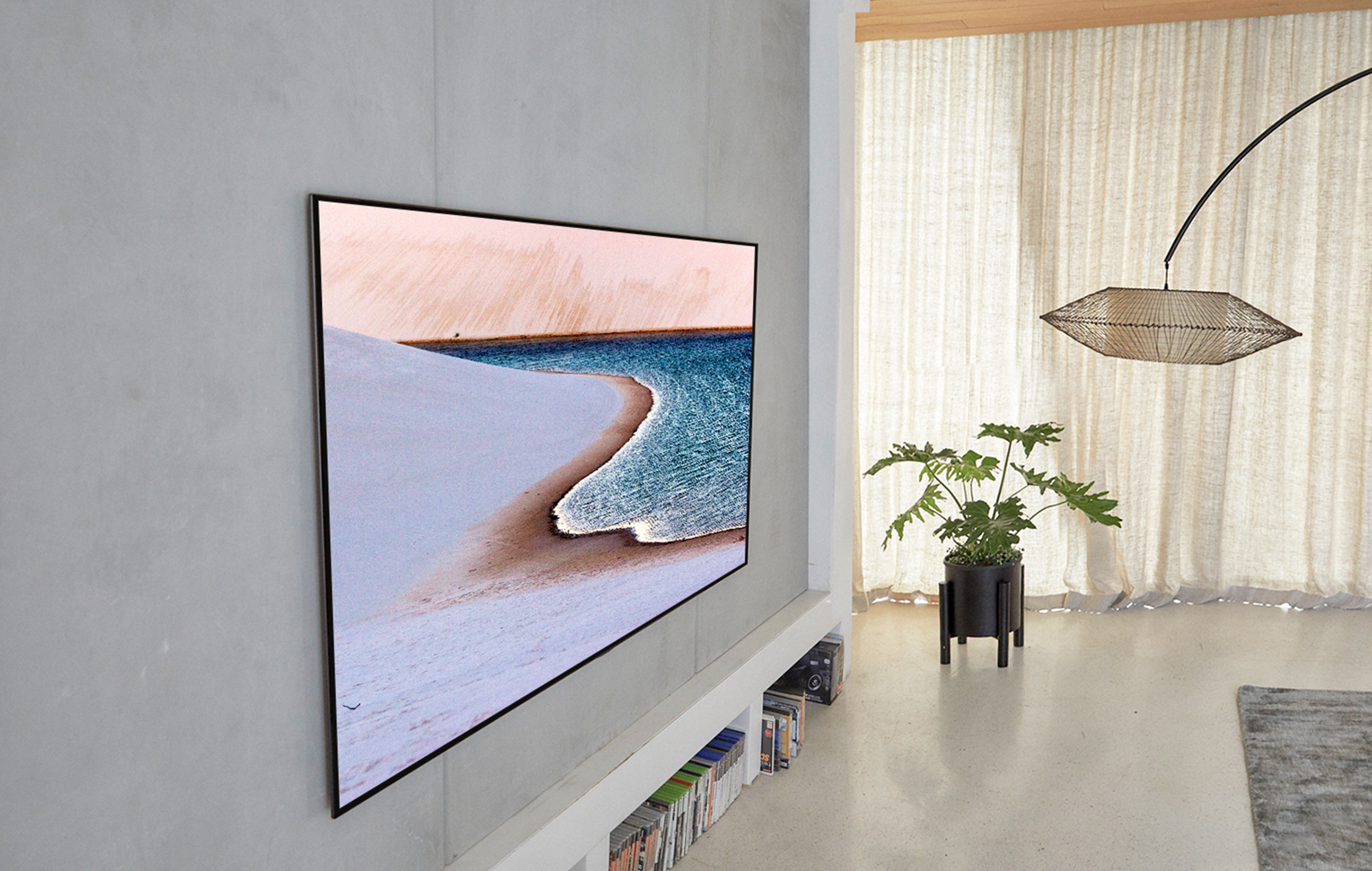 OLEDGX är som konst LG OLED GX på vägg i ett vardagsrum