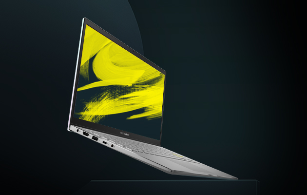 Formfaktorn du vill ha Vit ASUS Vivobook S14 snett från sidan