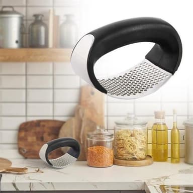 Smart Vitlökspress utformat som handtag