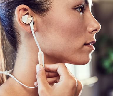 Fitbit Flyer trådlösa in-ear hörlurar (grå)