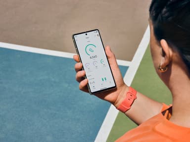 Fitbit Charge 6 aktivitetsarmband (guld/orange)