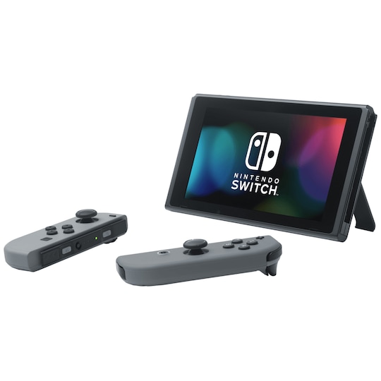 Nintendo Switch OLED gamingkonsol med vita Joy-Con-kontroller - Elgiganten