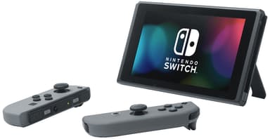 Nintendo Switch OLED gamingkonsol med vita Joy-Con-kontroller - Elgiganten