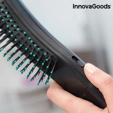 Hårborste med stimulerande vibrationsmassage innovagoods
