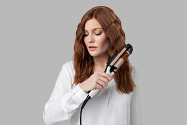 Remington PROLuxe 4-i-1 justerbar locktång CI91AW