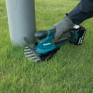 Makita DUM604ZX kant- / häcksax (utan batteri)