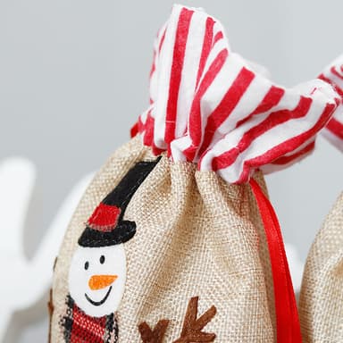 Julklappssäck liten med snögubbe