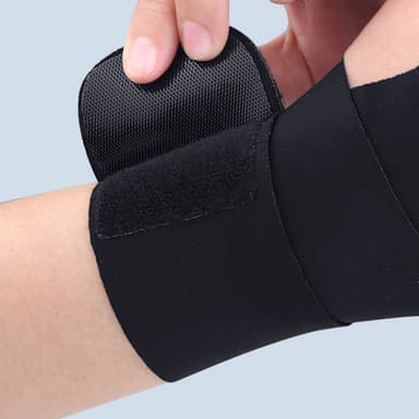 Handledsstöd / tumbandage för höger hand Svart