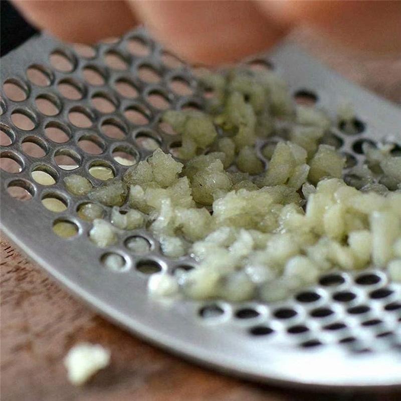 Vitlökspress med handtag