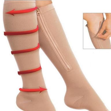 Kompressionsstrumpor med dragkedja och öppen tå i nylon/spandex beige