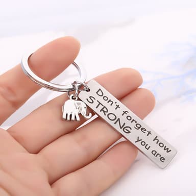 Nyckelring med elefant och inspirerande text Silver