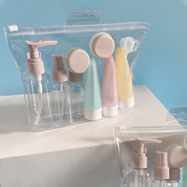 Set med reseflaskor, burkar och tillbehör 11 delar