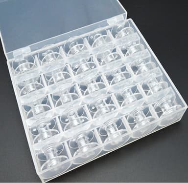 Tomspolar för symaskin plast 25 st Transparent