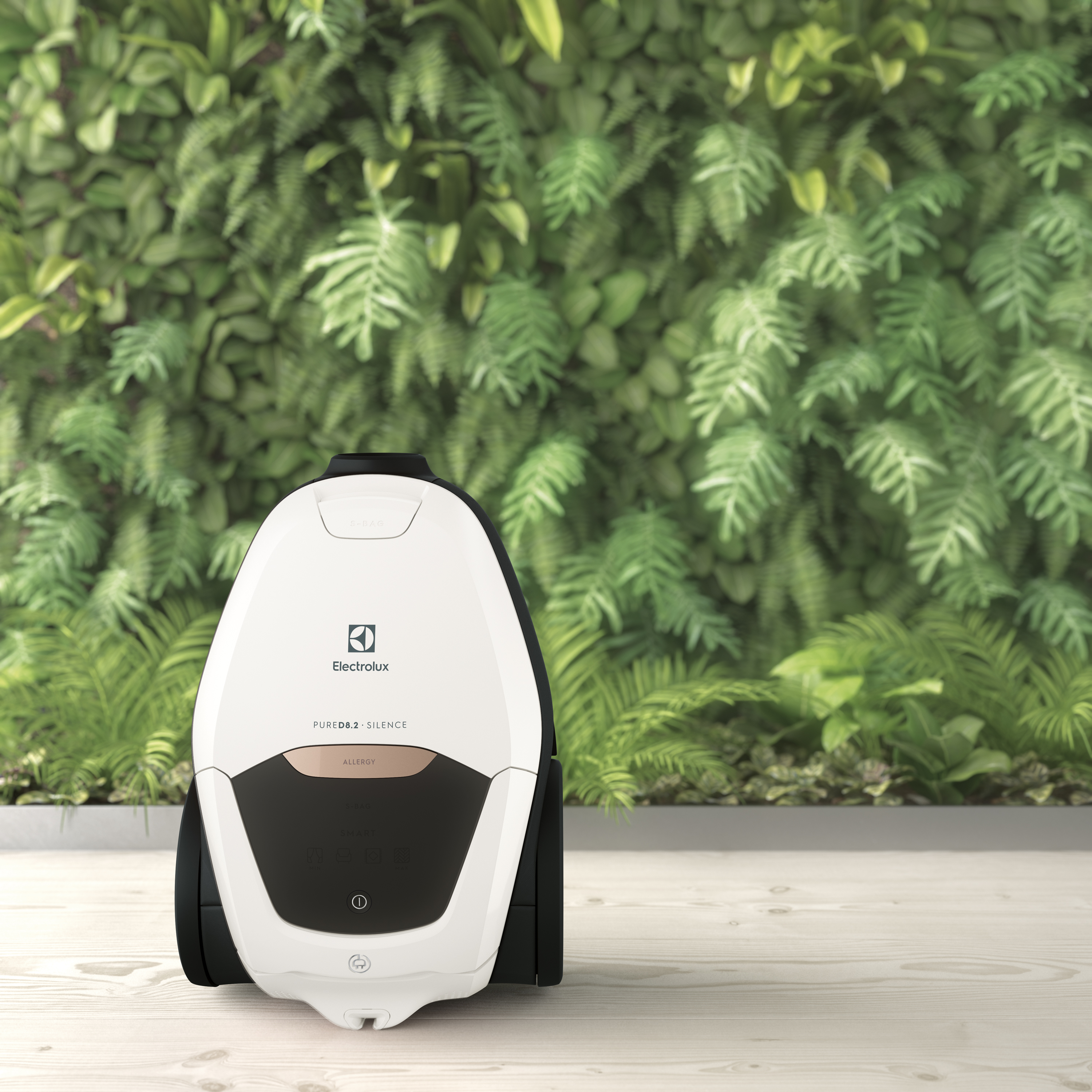 Produktbild av en vit Pure D8.2 framför plantor