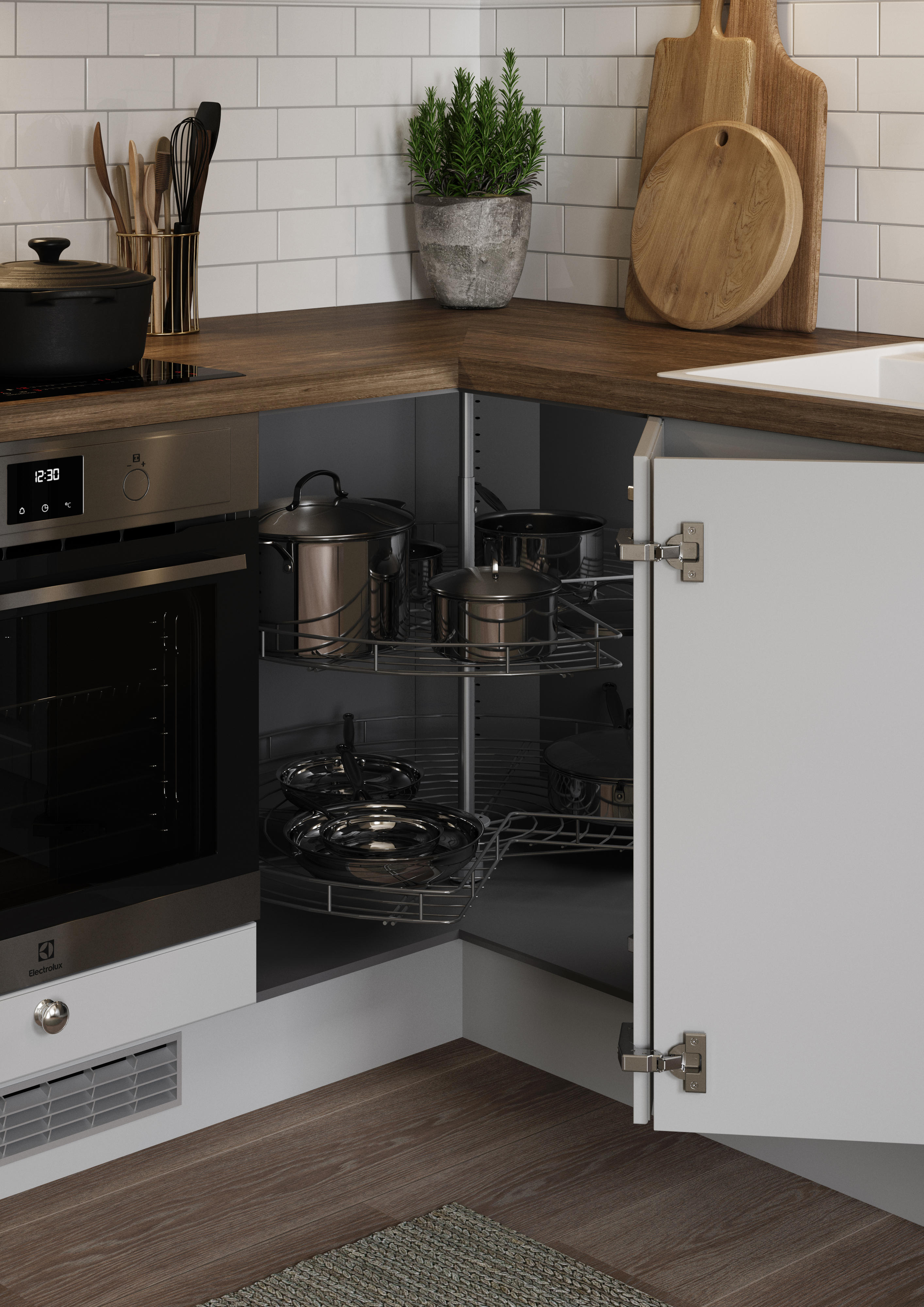 A Corner Carousel with pots and pans in an Epoq Heritage Light Grey kitchen with a dark wooden worktop