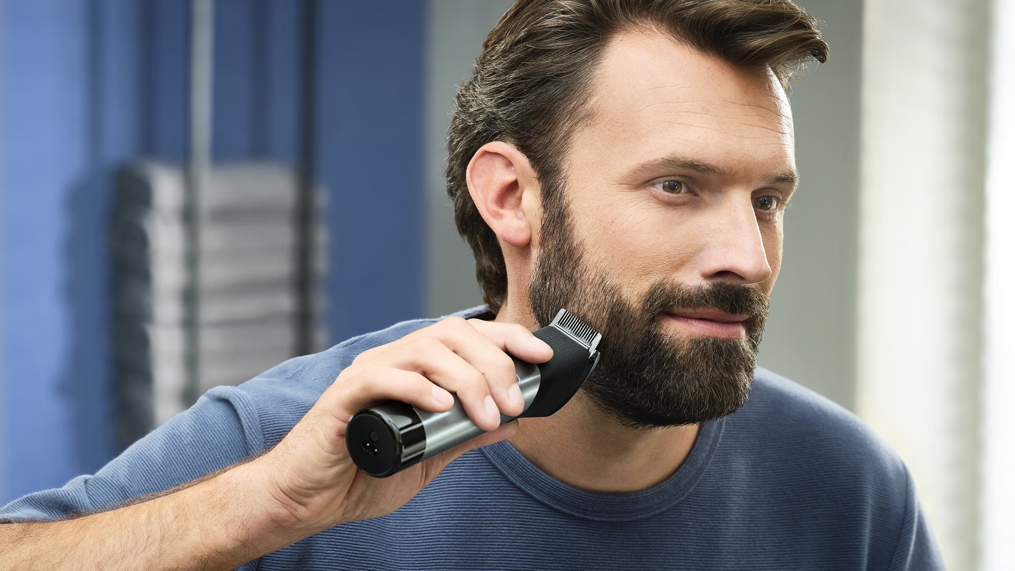 Man using beard trimmer