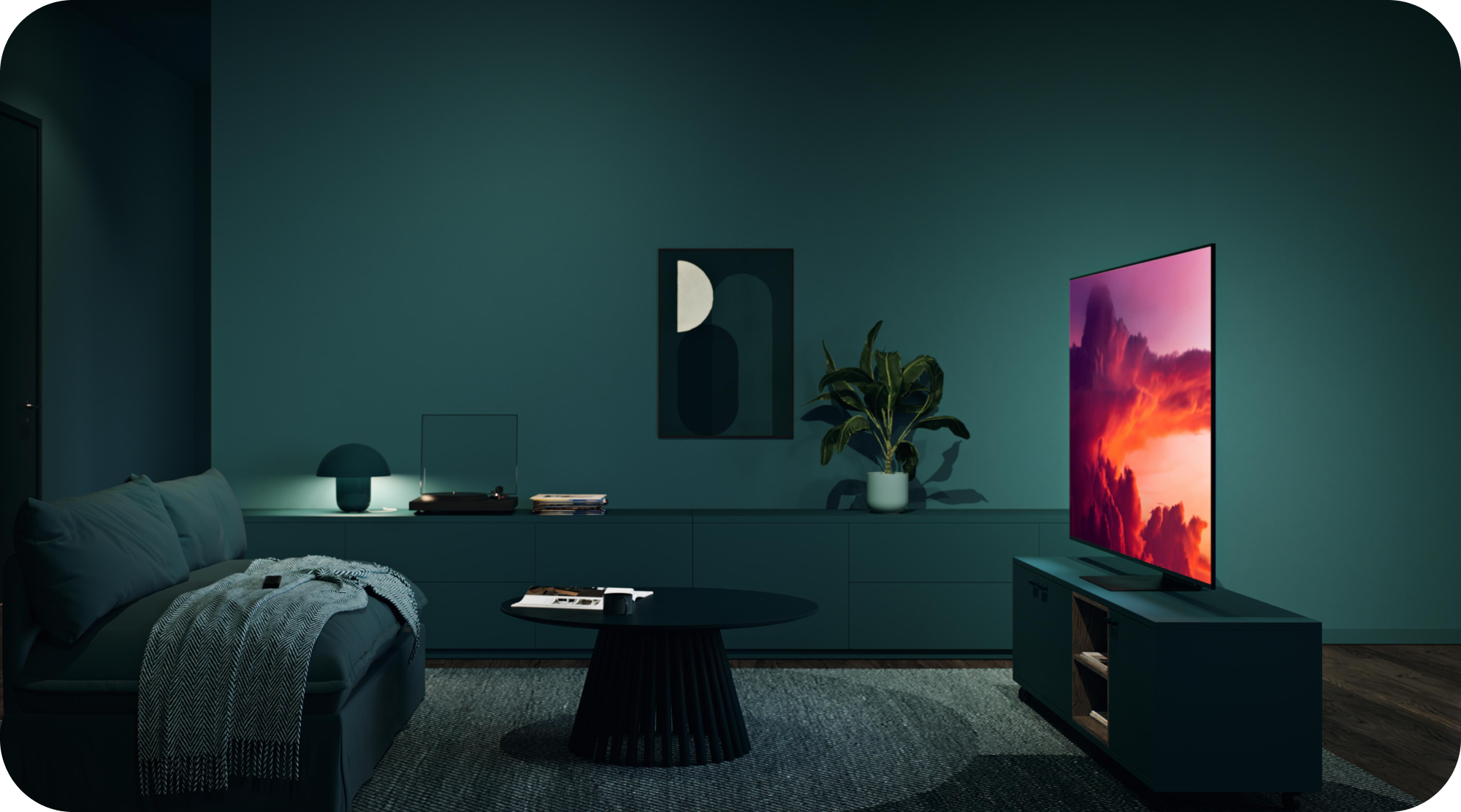 Samsung OLED TV in a living room with green walls