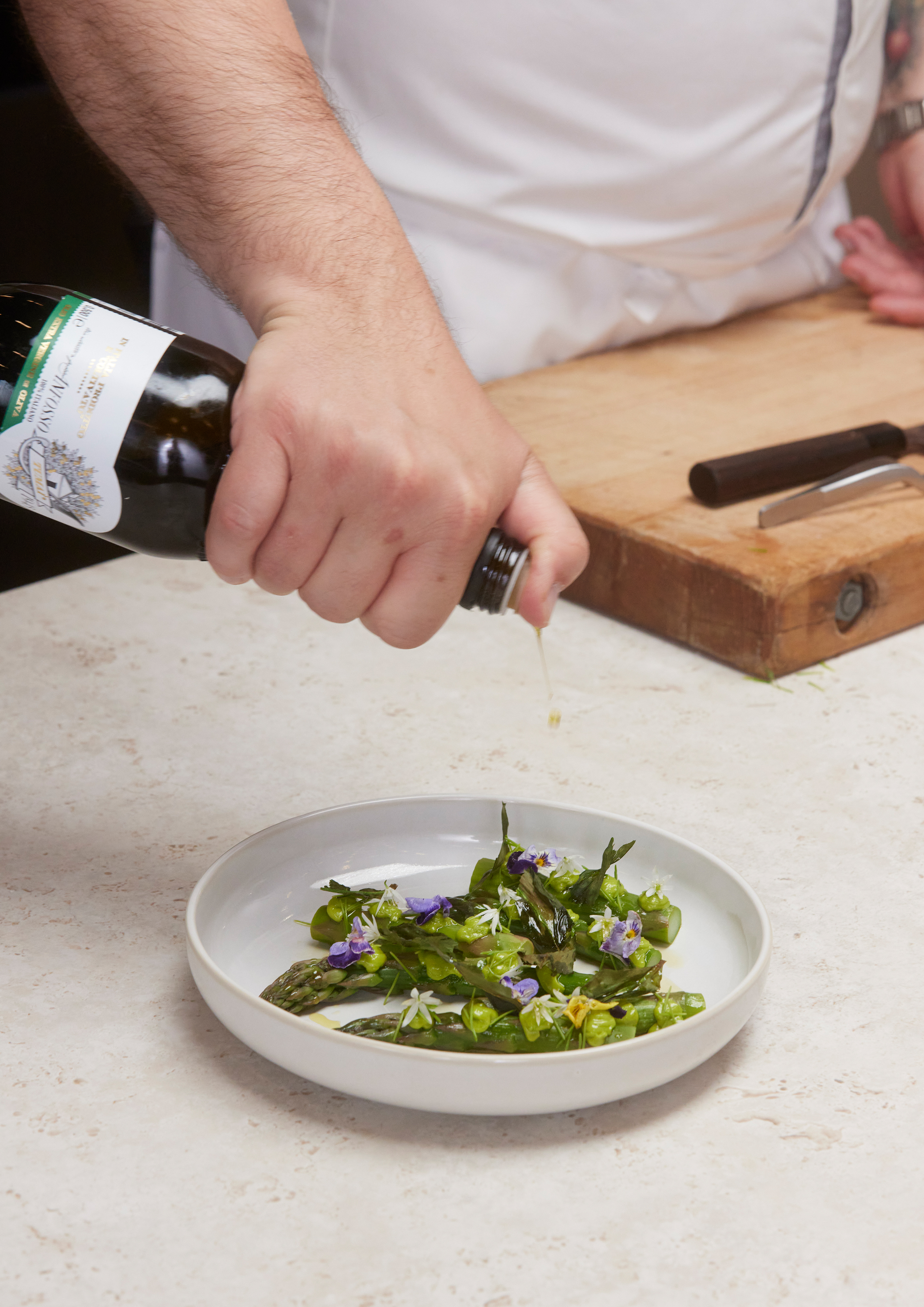 Asparagus that has been steamed to perfection in a Bosch accent line oven is garnished with olive oil