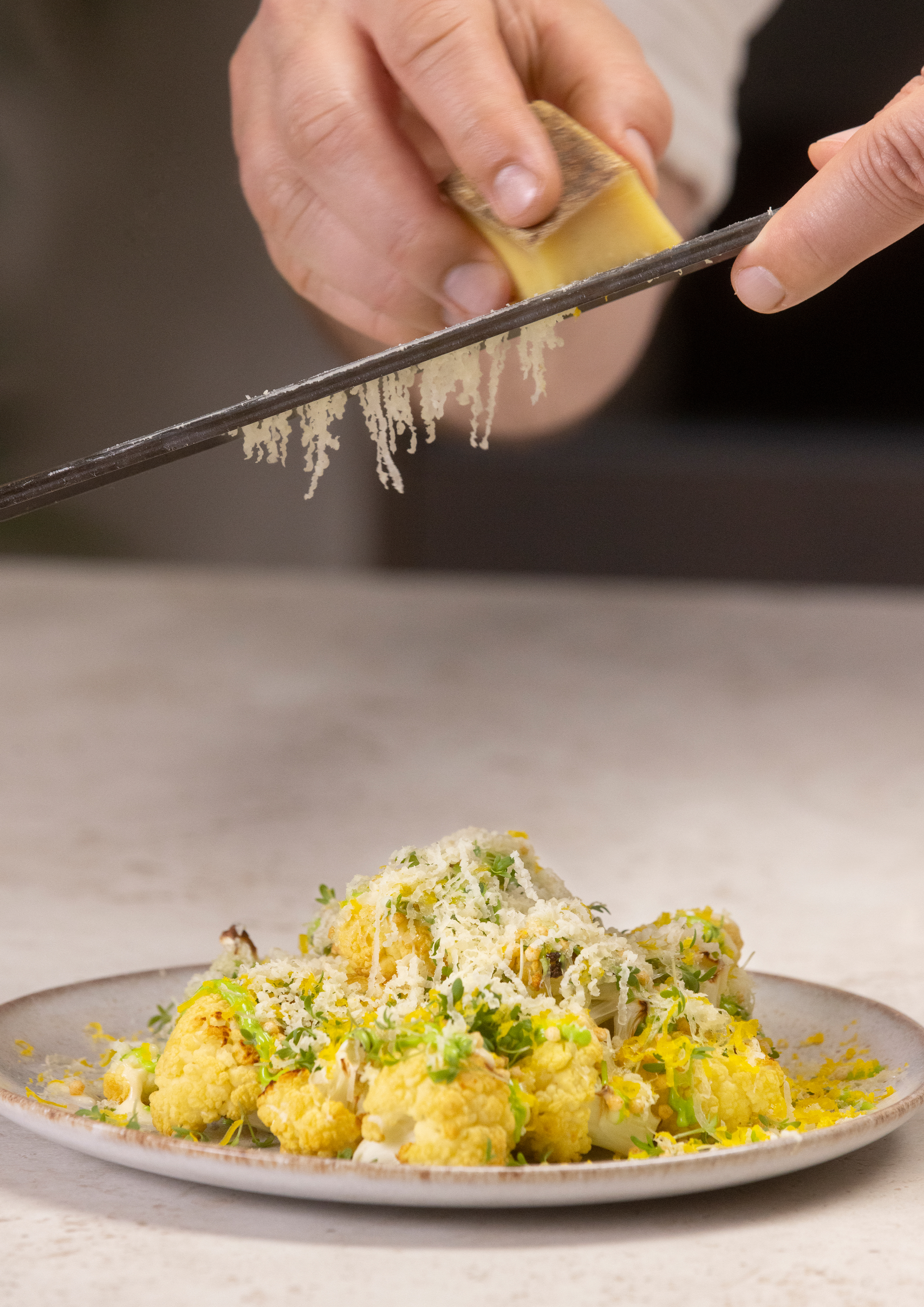 Fried cauliflower that has been fried in a Bosch accent line oven is decorated with herbs