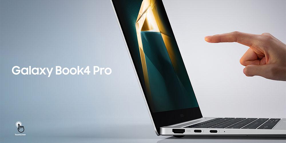 Galaxy Book4 Pro i platinasilver och en persons finger på väg att röra vid skärmen