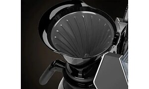 Justerbar filteröppning på en kaffebryggare.