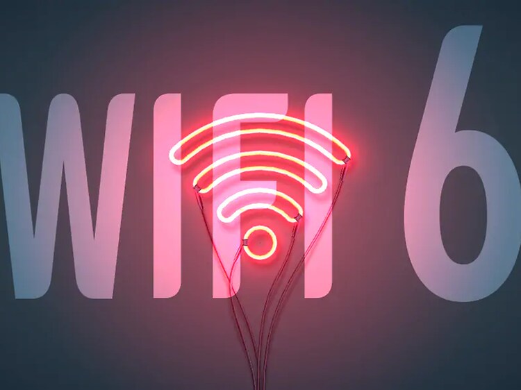 WiFi 6 text på en svart vägg med en wifi-symbol för signalstyrka i neonljus. 