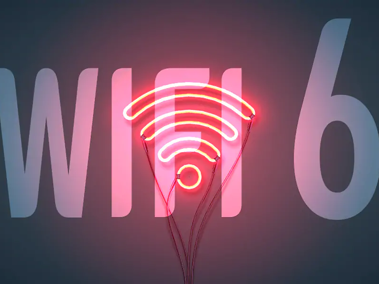 WiFi 6 text på en svart vägg med en wifi-symbol för signalstyrka i neonljus.