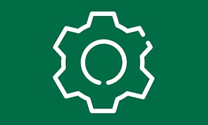Symbol för cookies, ett vitt kugghjul på grön bakgrund. 
