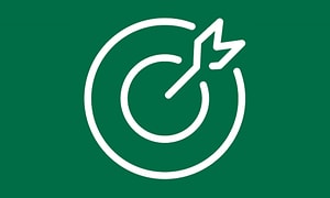 Symbol som visar prismatch, en vit pil på en rund piltavla med grön bakgrund. 