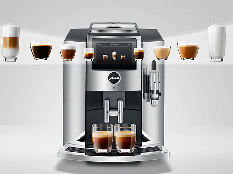Jura kaffemaskin med illustrationsbild på olika typer av kaffe som svävar i luften. 
