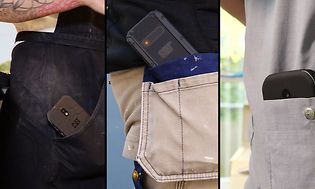 Cat phones in three different pockets
