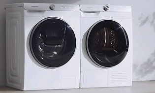 MDA - Samsung - Waher and dryer in an empty room