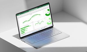 Windows 11 laptop on a white table
