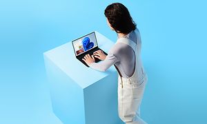 Woman working on a Windows 11 laptop