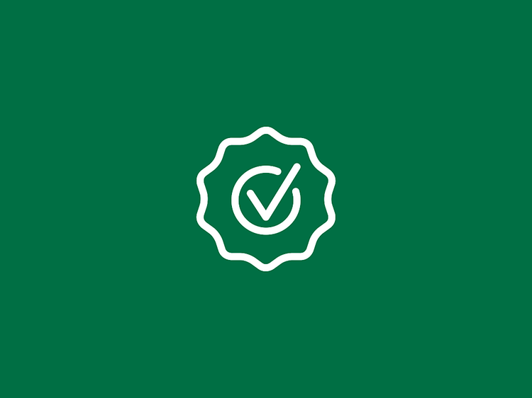 Garanti logo mot grön bakgrund