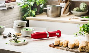 Red cordless KitchenAid stick mixer