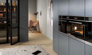 Electrolux Oven 302216 integrerad i ett grått kök