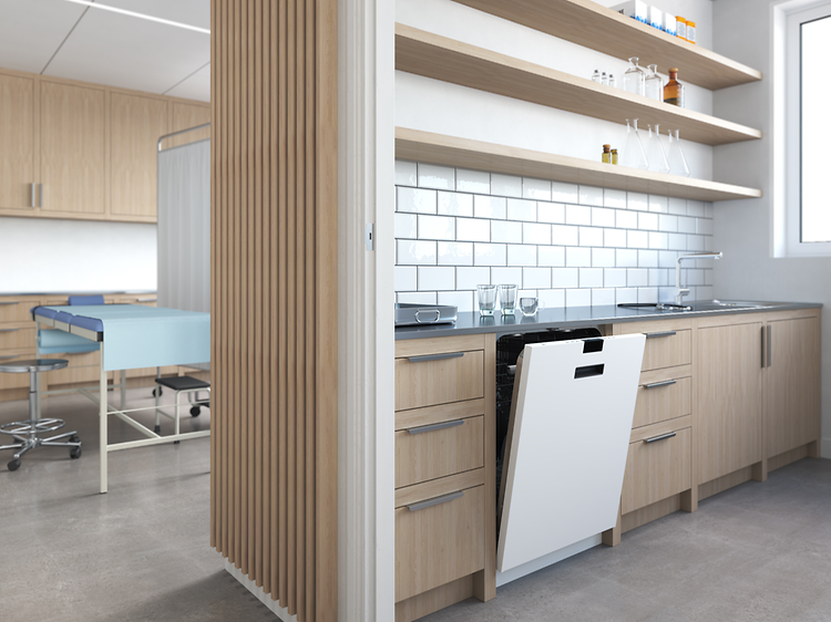 White dishwasher in a wooden kitchen