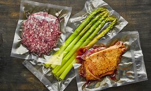 MDA-Ovens-Sous vide-förpackat kött och grönsaker
