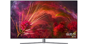 QLED TV med färglad bild på skärm där det även står QLED TV