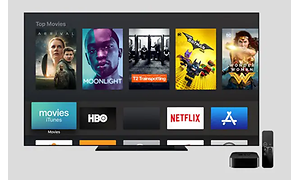 Startbild från Apple TV med olika filmer, Netflix logga och HBO med mera.