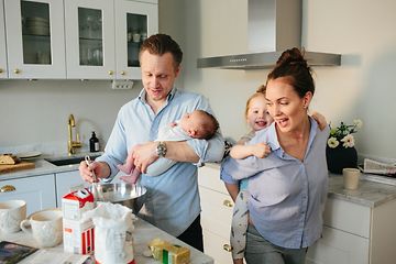 A family cooking in their kitchen