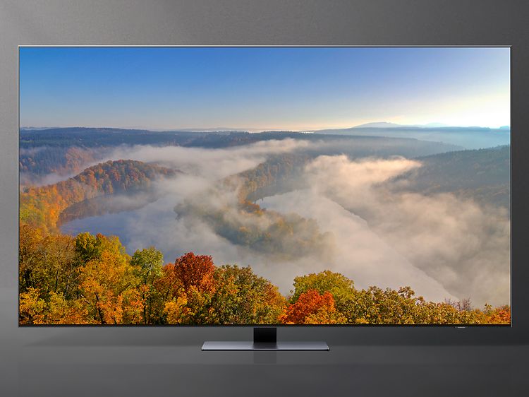 Samsung TV med landskapsmotiv på skärmen.