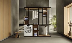 MDA-Miele-Stor modern tvättstuga med med tvättmaskin och tvättmedel bredvid