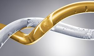 MDA-Miele -TwinDos-Illustration av en vit och en guldig kabel med vattendroppar på som lindas runt varandra