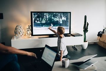 Brown-goods-TV-Little boy pointing at the screen on a TV