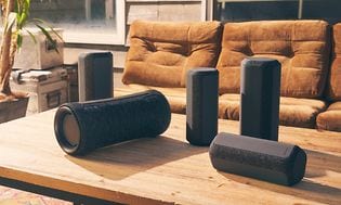 Sony - SRS-XG300 - Sony Bluetooth speakers on a table