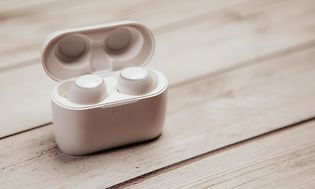 Brown goods -Earbuds-White earbuds in case