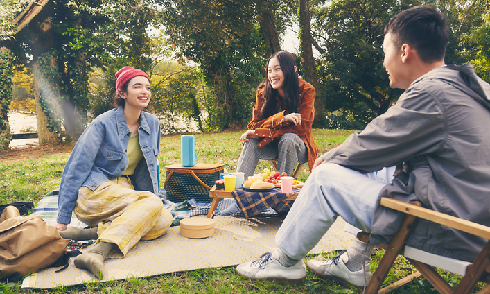 Sony-People in park with Sony speaker