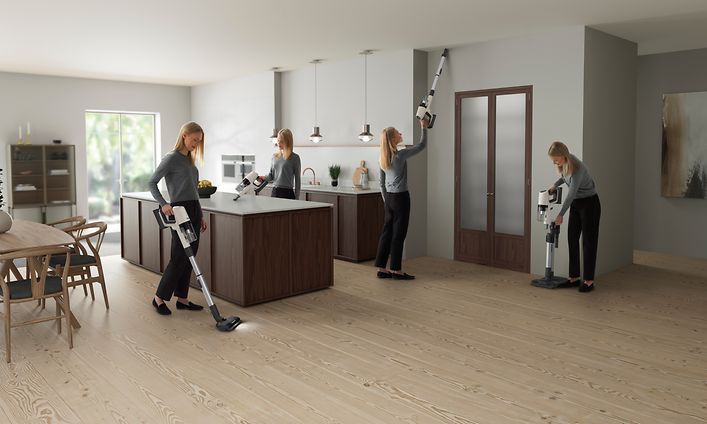 Electrolux- Cleaning-Woman using a stick vacuum cleaner from Electrolux